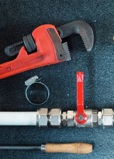 PLumbing drain and wrench